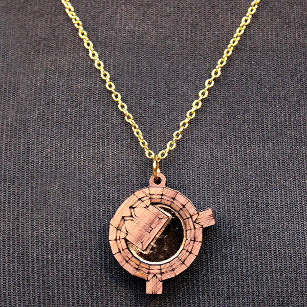 Walnut wood necklace in the shape of an architectural plan on a gold-coloured chain