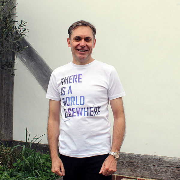 white colour t-shirt with a large typographic print on the chest. An image of stars is used as the fill for the words