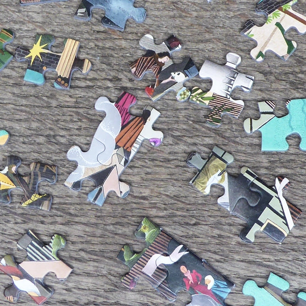 Scattered puzzle pieces in a variety of colours