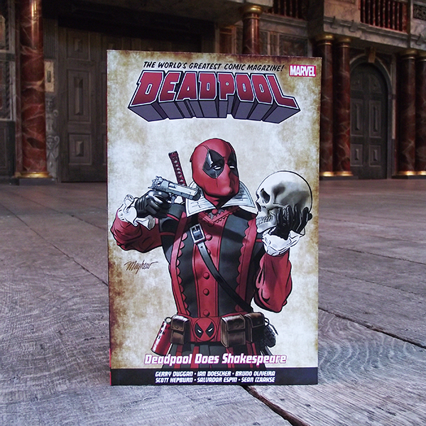 A paperback copy of 'Deadpool Does Shakespeare' featuring the character Deadpool on the cover, holding a skull and a gun, with a Shakespearean backdrop.