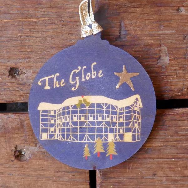 Blue round wooden decoration with 'The Globe' and stylised drawing of the Globe Theatre