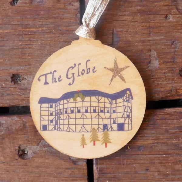 Natural round wooden decoration with 'The Globe' and stylised drawing of the Globe Theatre in blue