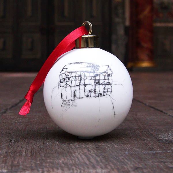White glass bauble with black etched drawing of Shakespeare's Globe and gold top, with red tied ribbon