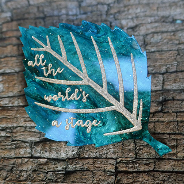 Jewel green leaf brooch with gold engraved text