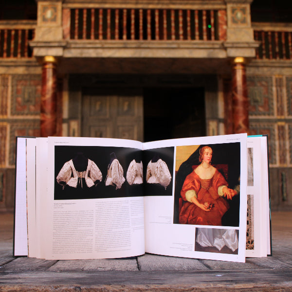 
                  
                    Open hardback book with historical images of 17th century women's dress and black text
                  
                