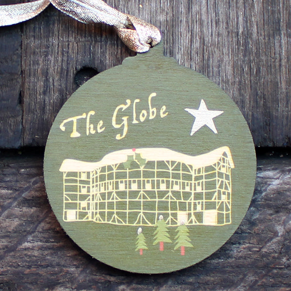 Green round wooden decoration with 'The Globe' and stylised drawing of the Globe Theatre
