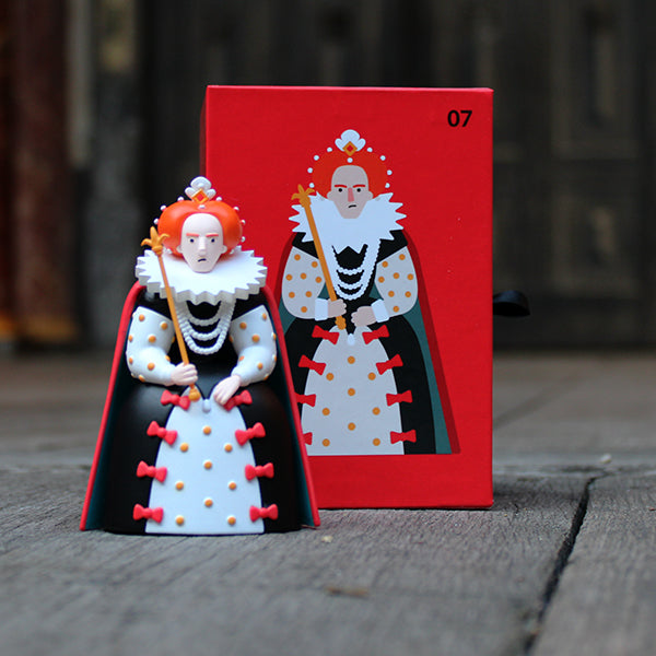 Black, red, yellow and white Queen Elizabeth I art toy made of pvc with red hard card box