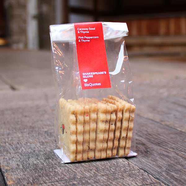 Packaged cookies with a red label on a wooden surface