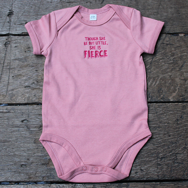 Pale pink cotton baby grow with hot pink centred graphic text