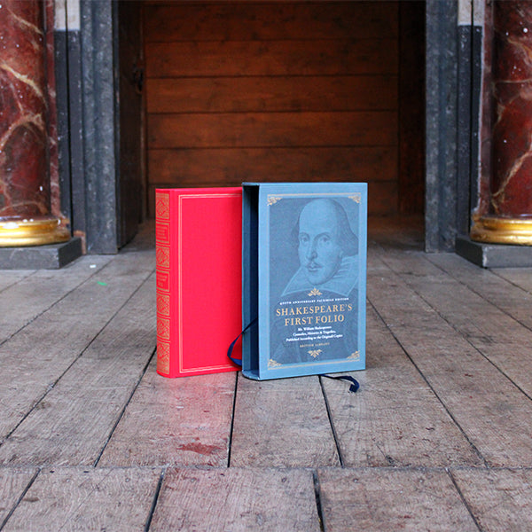 Red hardback book with blue hard slip case with image of William Shakespeare and gold and white text