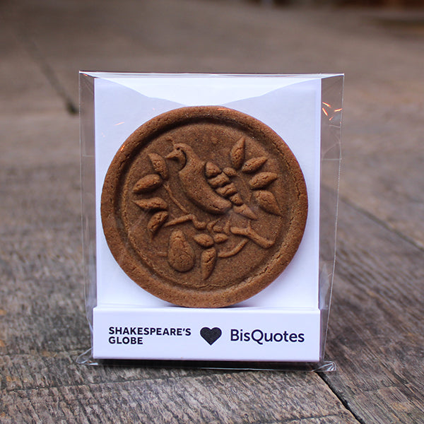 Brown circular biscuit with embossed design in a clear package with 'Shakespeare's Globe' and 'BisQuotes' branding.