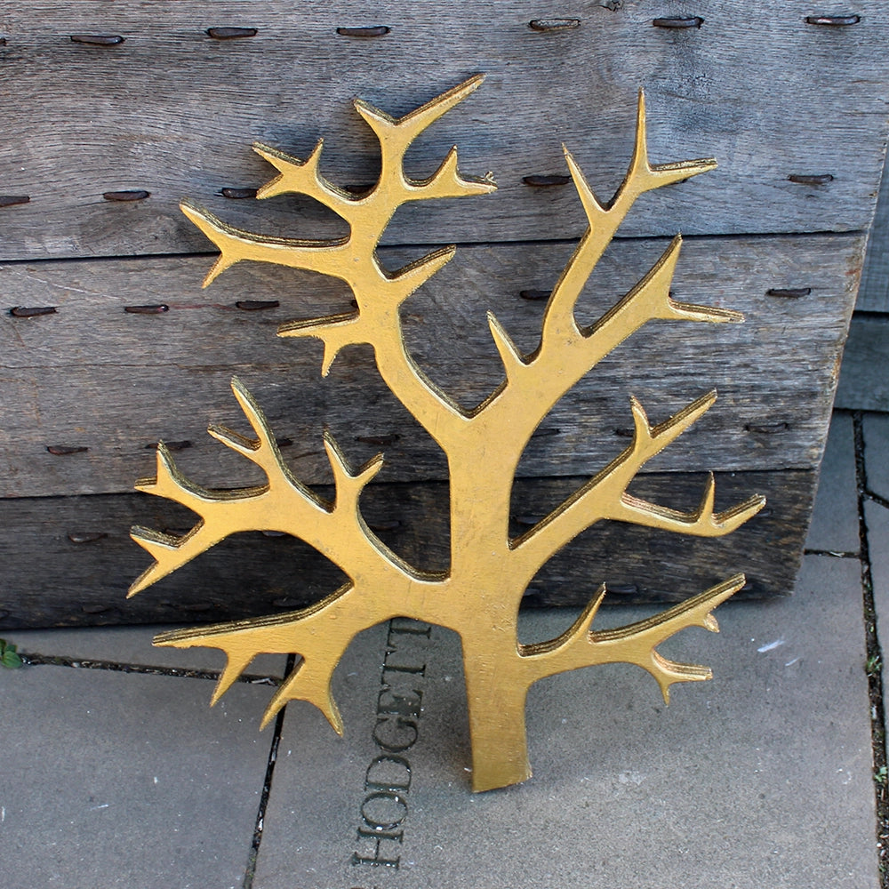 Stylised wooden tree branch painted gold