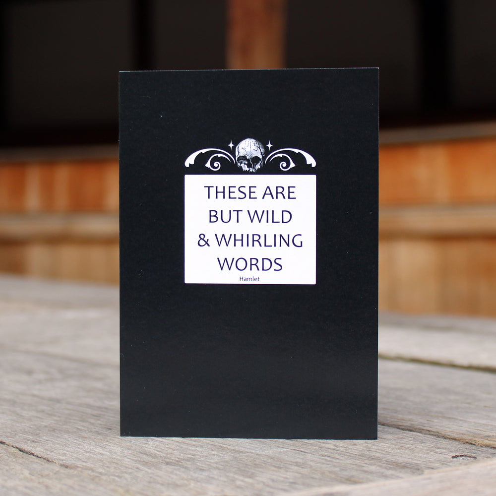 black greetings card with a white square containing a quote. The square has a skull in white above it.