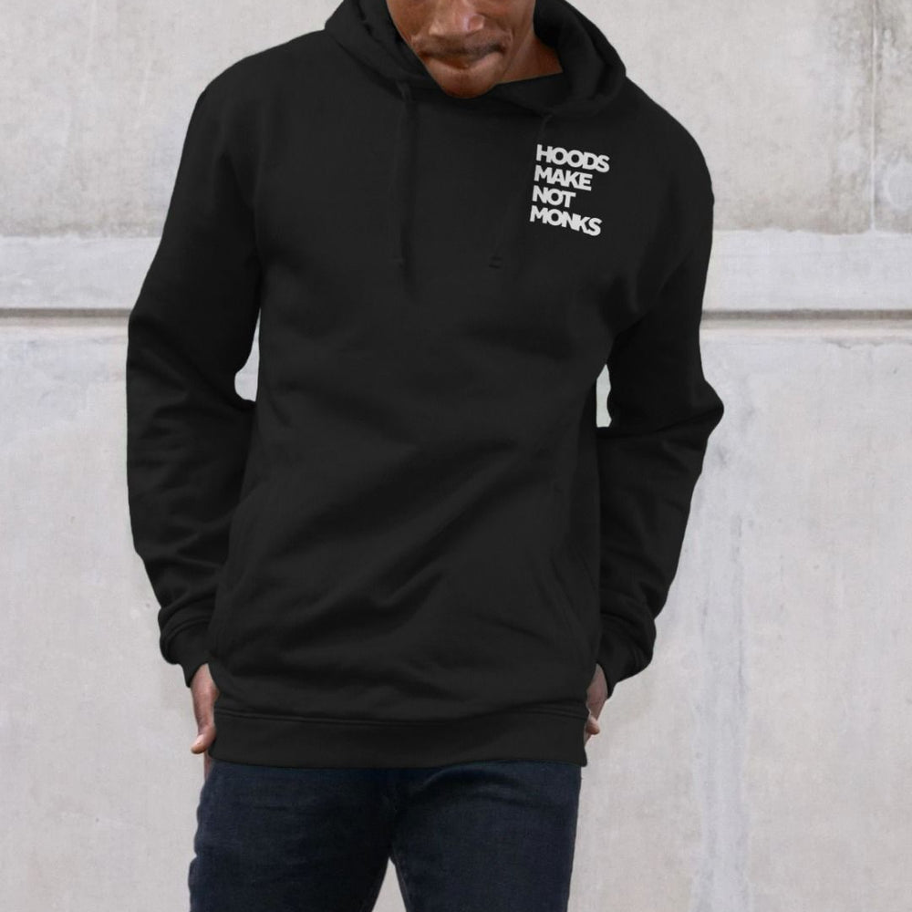 Black cotton hoodie with front pockets and a print on the upper left chest of a quote in heavy white text