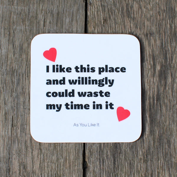 White melamine coaster with a quote in black letters and red hearts