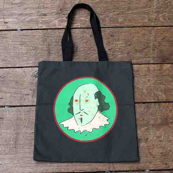 Black cotton bag with black handles and a print of a zombified Shakespeare on a green oval