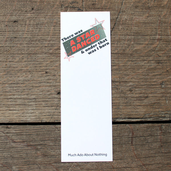 Off white card bookmark with red and black graphic text image at top.