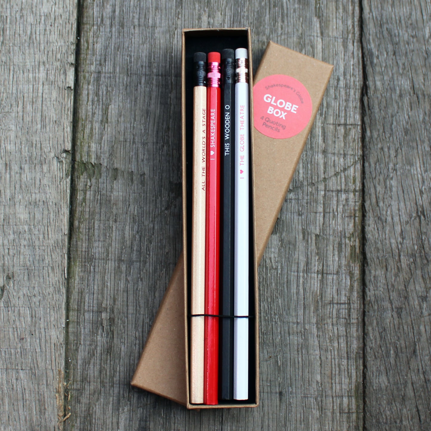 Kraft card box containing four pencils with erasers