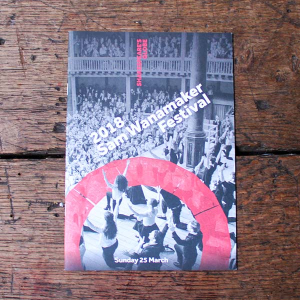 A black and white theatre programme with a red round logo