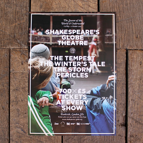 poster with a photograph taken inside the Globe Theatre. Audience members look up at an actor on the stage