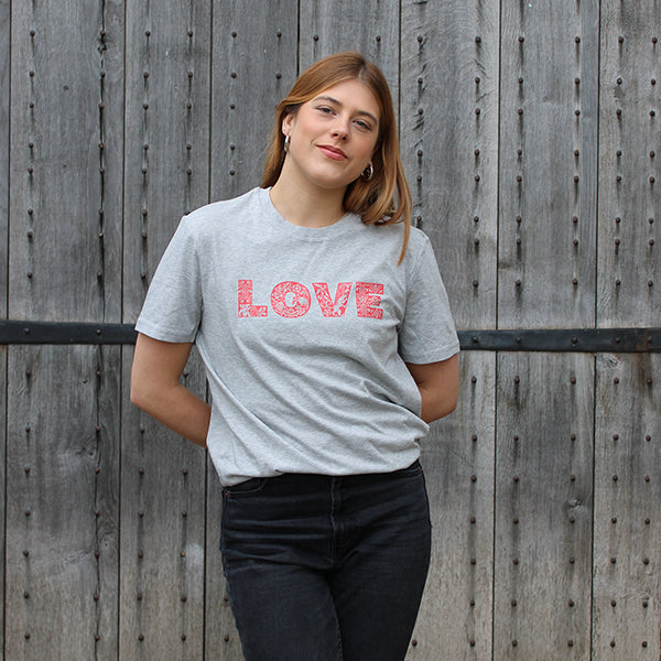 Grey heathered unisex tshirt with bold red graphic text across chest depicting LOVE