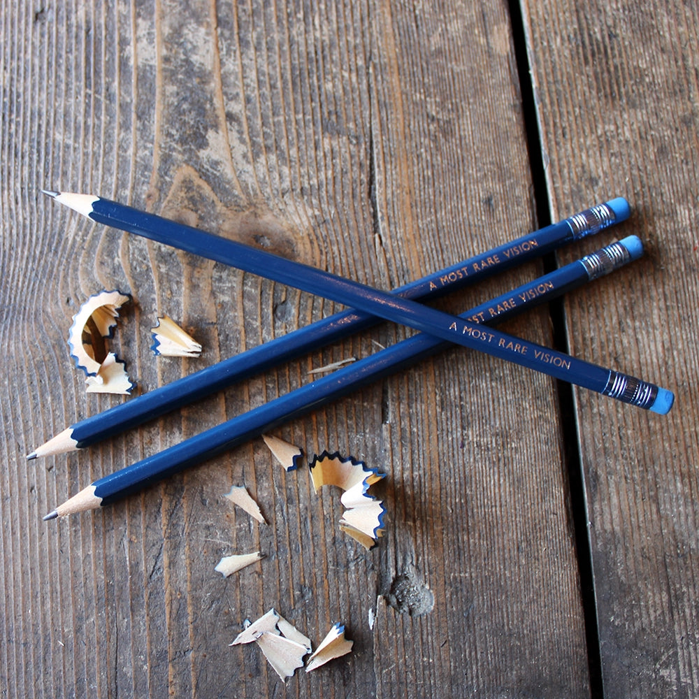 
                  
                    Royal blue pencil with matching eraser, stamped with white text
                  
                