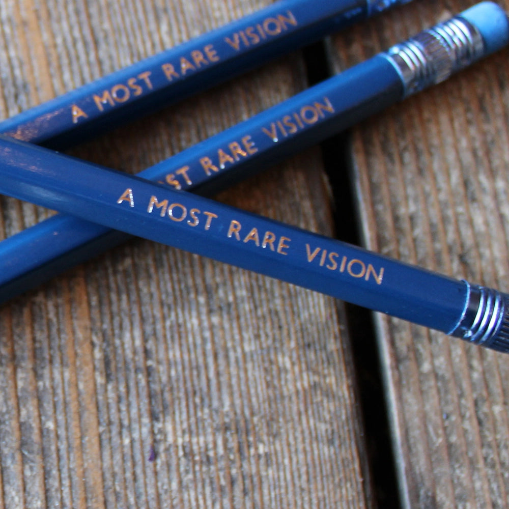 
                  
                    Royal blue pencil with matching eraser, stamped with white text
                  
                