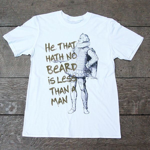 White t-shirt with gold graphic text and black and white historical image of man with a beard