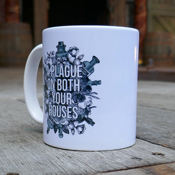 
                  
                    White ceramic mug printed with a design of flowers and poison bottles in black and light green
                  
                