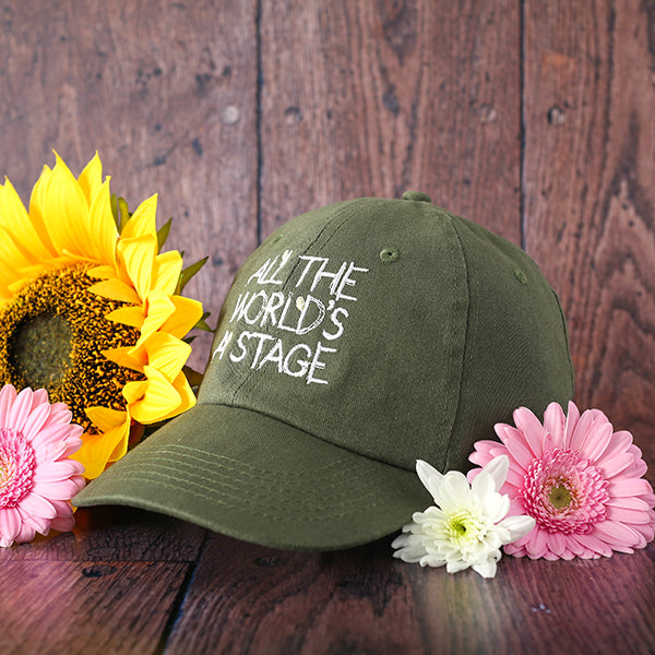 Olive green cotton baseball cap with white embroidered text and scattered flowers