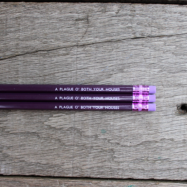 Deep purple pencil with lilac eraser, stamped with white text