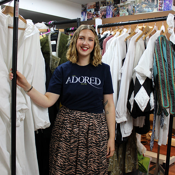 Navy blue t-shirt with centred white graphic text