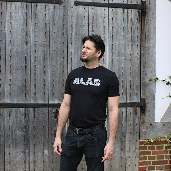 Black tshirt with white graphic text depicting ALAS across the chest