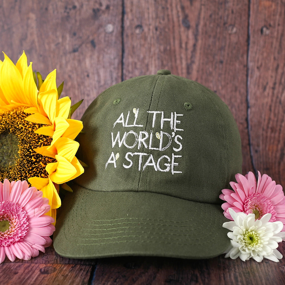 Olive green cotton baseball cap with white embroidered text and scattered flowers