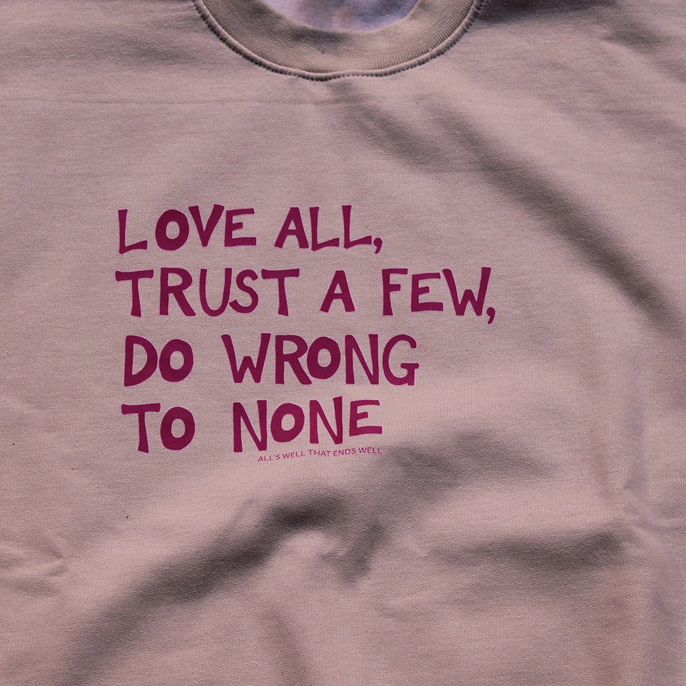 
                  
                    Sand coloured sweatshirt with fuchsia pink graphic text
                  
                