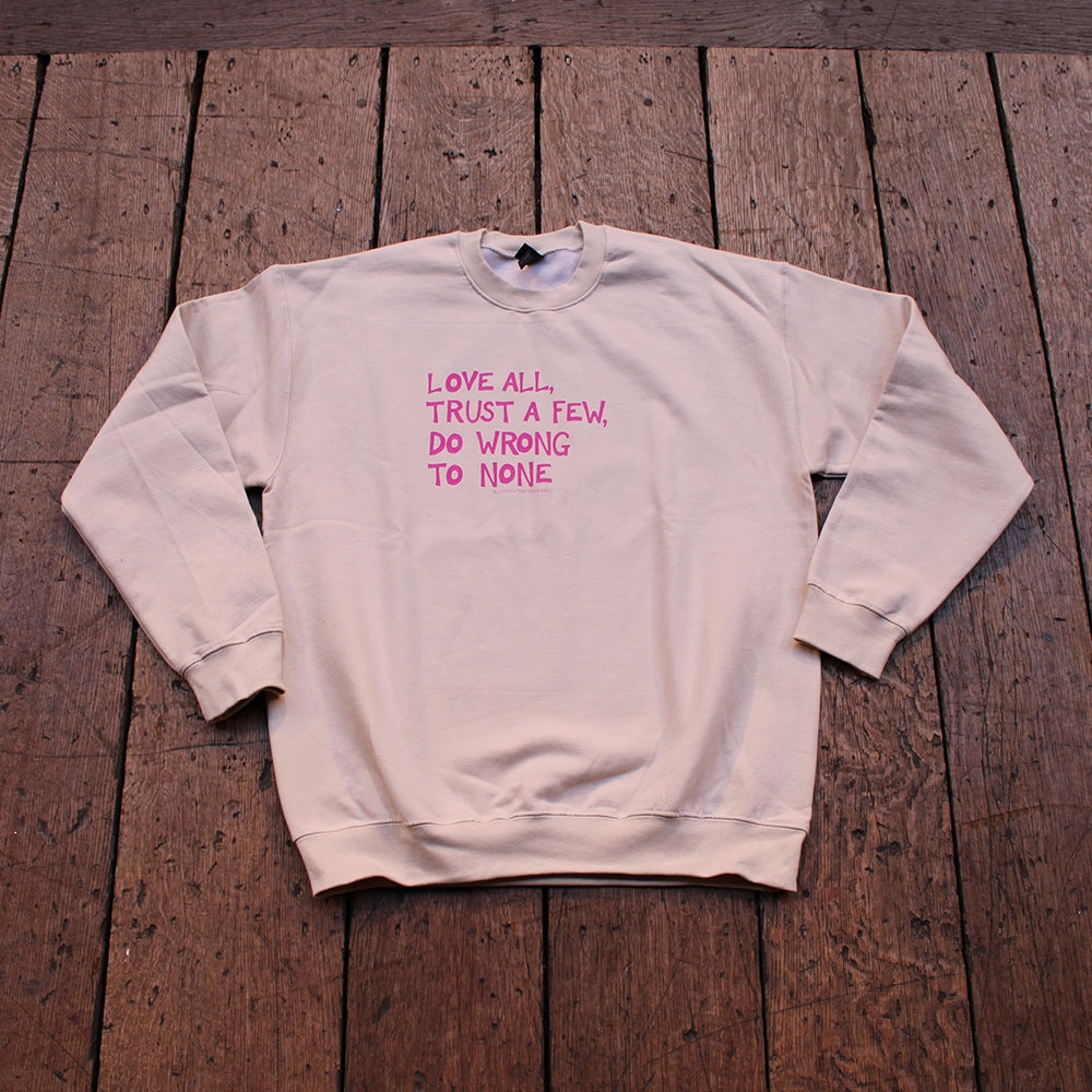 Sand coloured sweatshirt with fuchsia pink graphic text