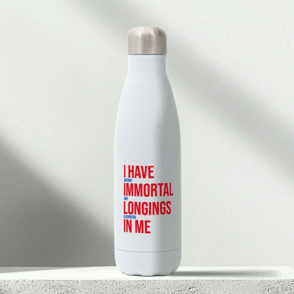 white metal water bottle with a silver metal lid. The bottle is printed with a quote in red block capitals