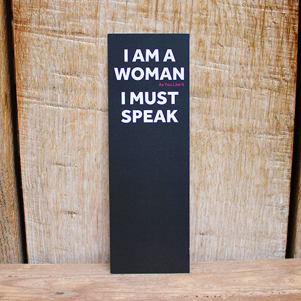 black card bookmark with white text on a wooden background