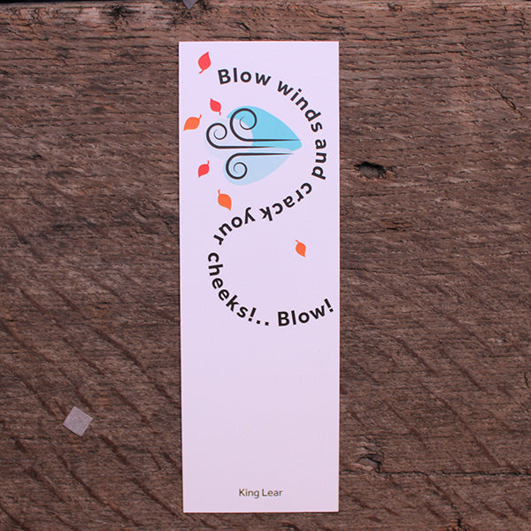 White hard card bookmark with swirling black text and art deco style images of leaves blowing in a gust of wind