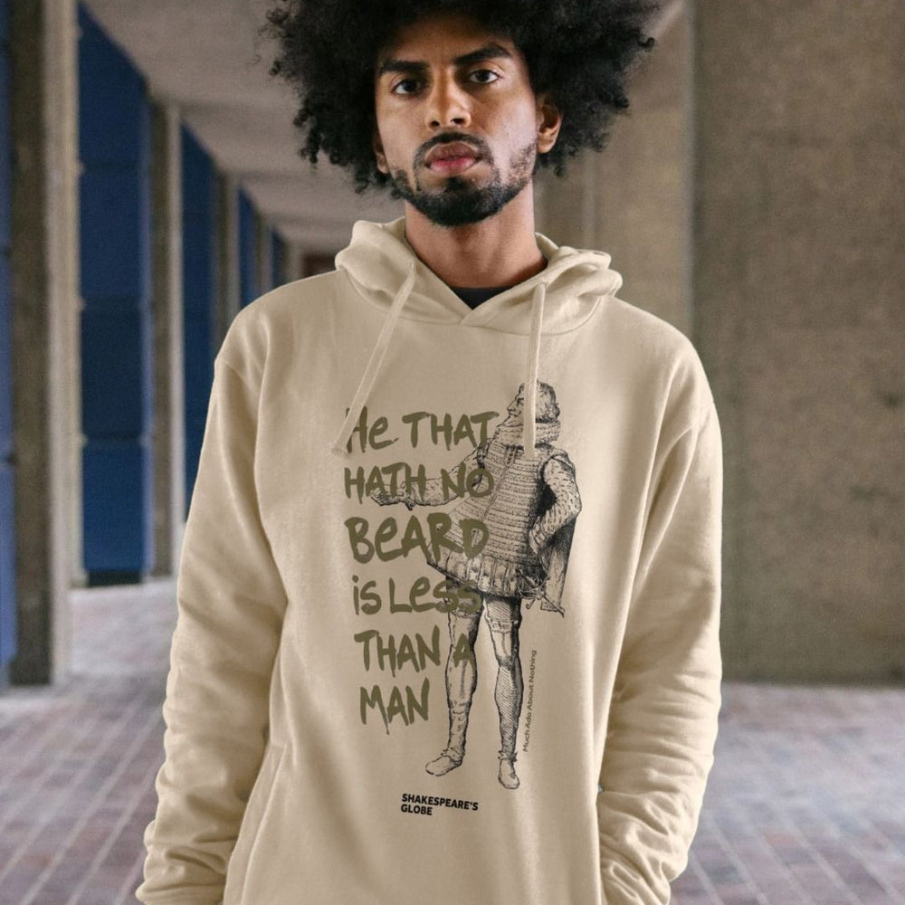 Oatmeal long sleeve hooded sweatshirt with black graphic image of Shakespearean man with gold graphic text over top