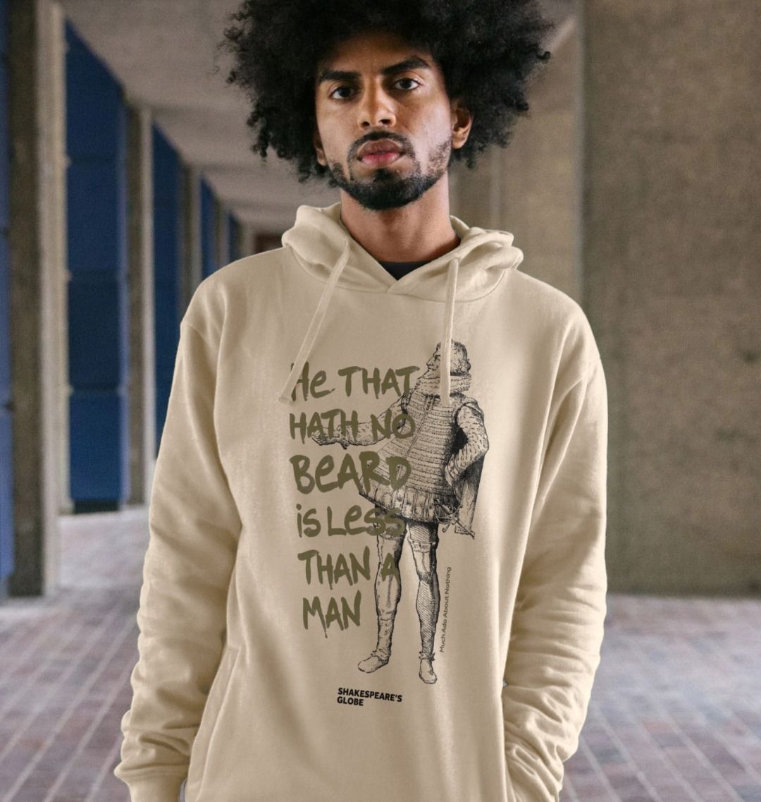 Oatmeal long sleeve hooded sweatshirt with black graphic image of Shakespearean man with gold graphic text over top