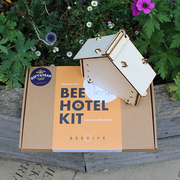 kraft card box with an orange label