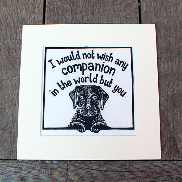 
                      
                        Off white mounted print with black linocut design of black labrador and stylised quote text above
                      
                    