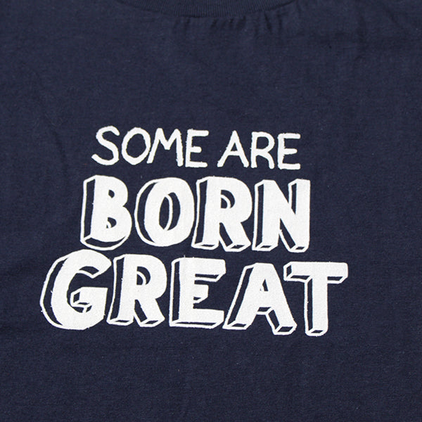 Navy blue kids t-shirt with white graphic cartoon stylized text in centre front