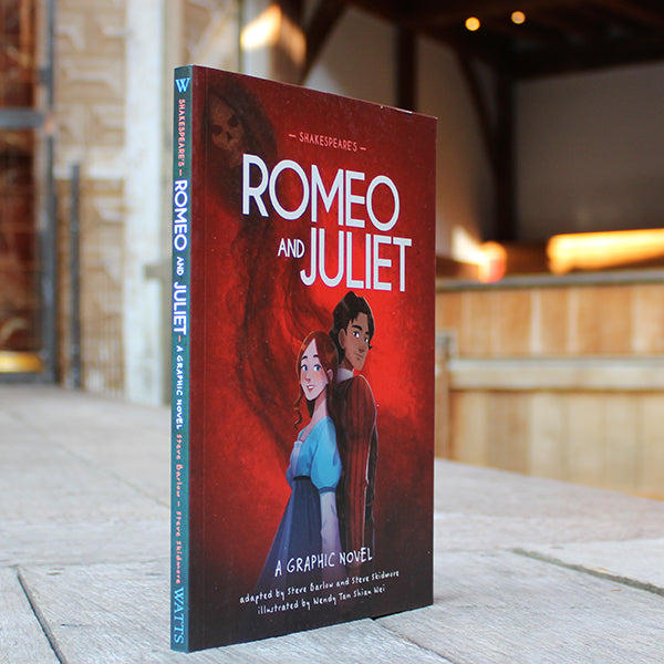 Paperback book with red cover and cartoon Romeo and Juliet