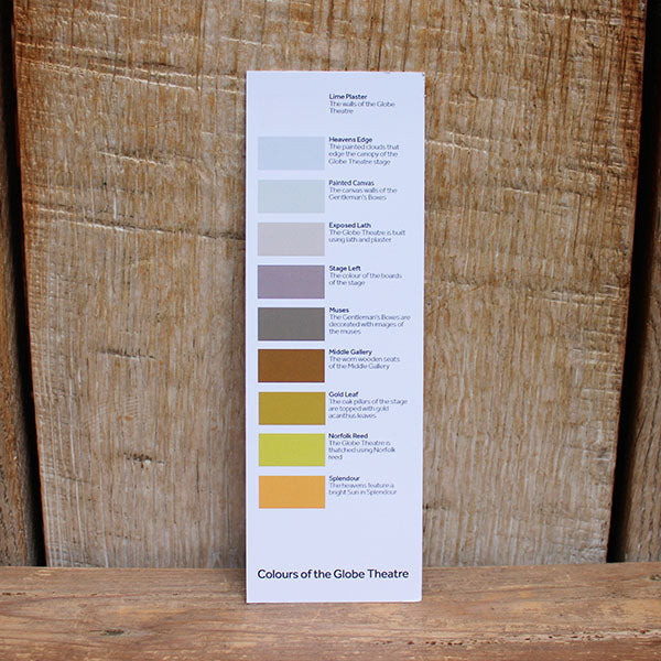 white card bookmark with blocks of colour on a wooden backround
