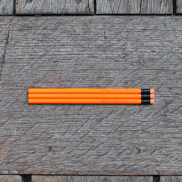 
                  
                    Neon orange pencil with matching eraser and gold etched text
                  
                