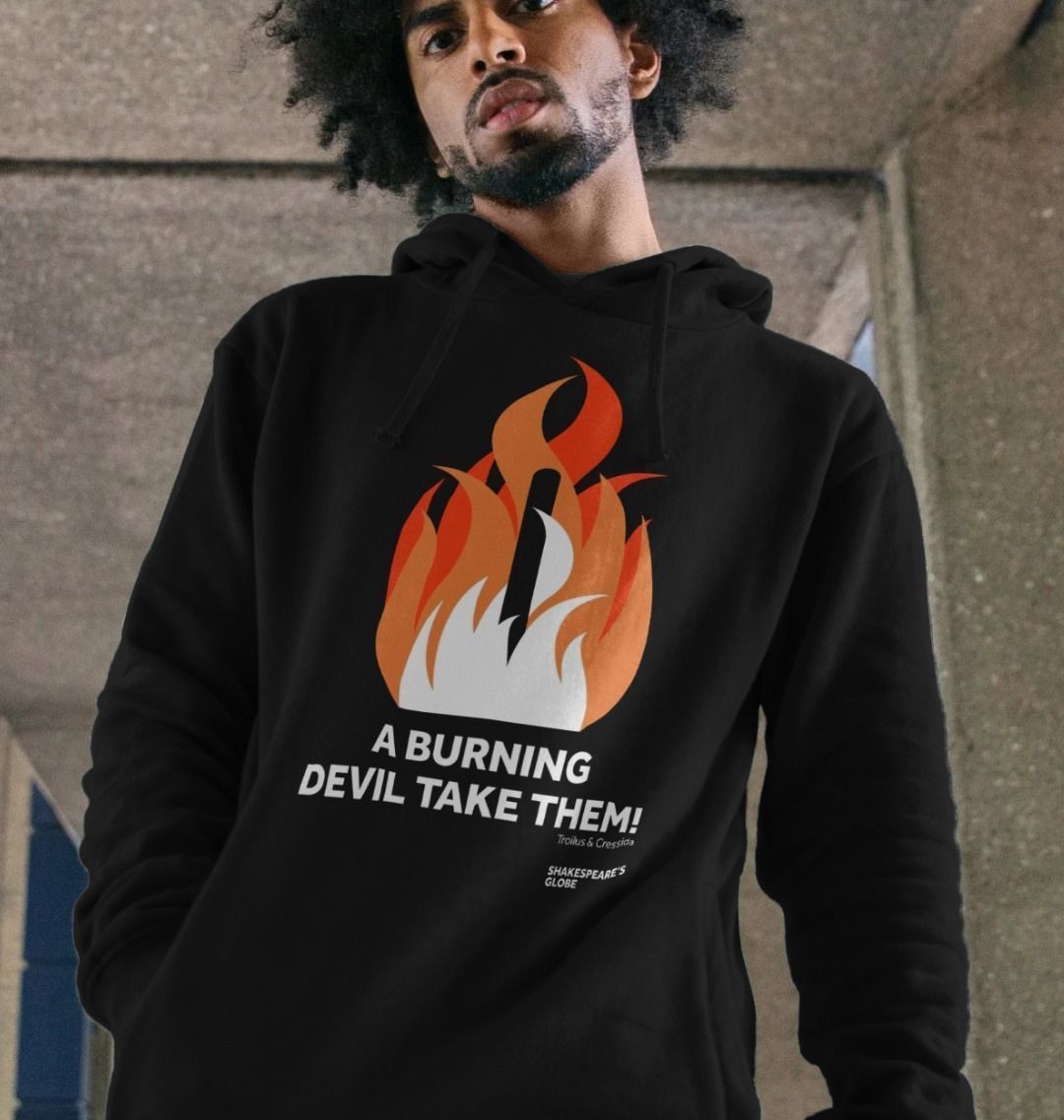 Black cotton hoodie with centre front graphic of shades of orange fire burning around a wooden stake, with white block text below