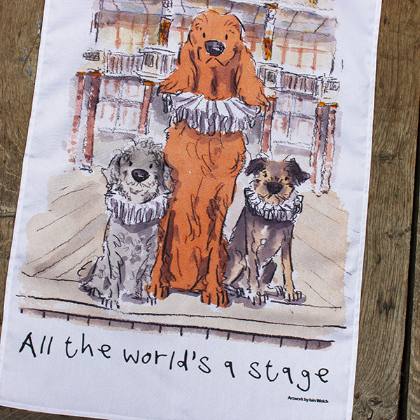 White cotton tea towel with stylised graphic of three dogs in ruffs on Globe stage