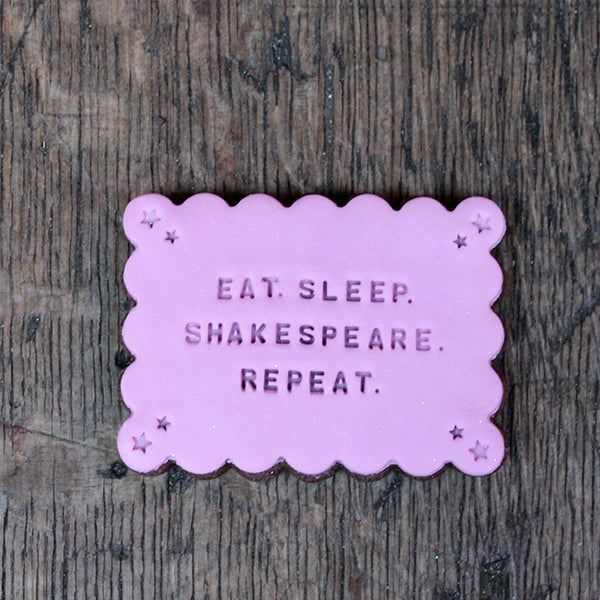 
                  
                    Pale pink colour rectangular Shakespeare quote biscuit
                  
                